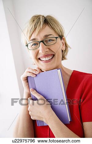 Woman with book. View Large Photo Image Stock Photograph - Woman with book.. Fotosearch