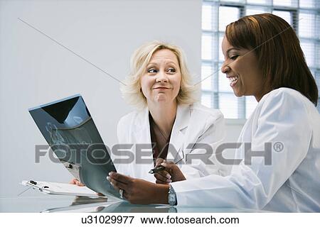 Women doctors View Large Photo Image Stock Photo - Women doctors. Fotosearch