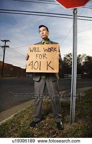 Young Businessman Holding 401k Sign View Large Photo Image Stock Photo - Young Businessman Holding 401k Sign. Fotosearch
