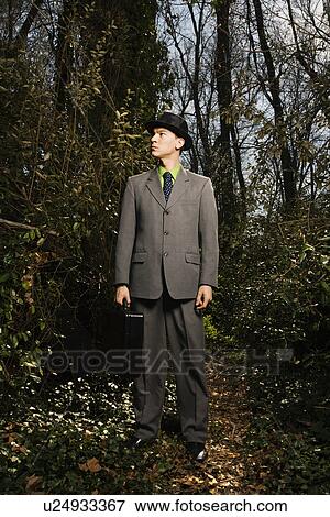 Young Businessman in Woods View Large Photo Image Stock Photo - Young Businessman in Woods. Fotosearch