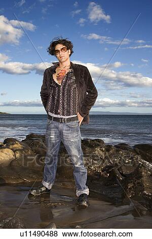 Stock Photo - Young Man at Beach. Fotosearch