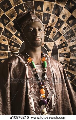 Stock Photography - Young Man in Traditional African Clothing. Fotosearch