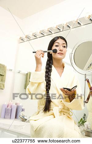 Young Woman Applying Makeup View Large Photo Image Stock Photography - Young Woman Applying Makeup. Fotosearch