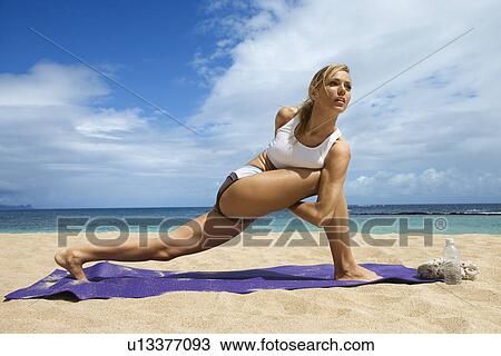 Young Woman Doing Yoga on Beach View Large Photo Image Stock Image - Young Woman Doing Yoga on Beach. Fotosearch