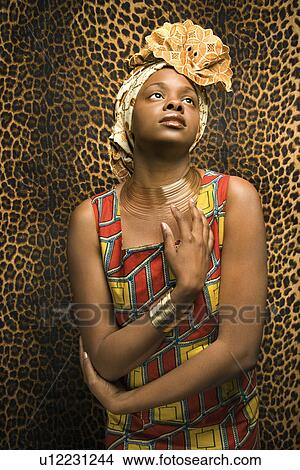 Picture - Young Woman in Traditional African Dress. Fotosearch