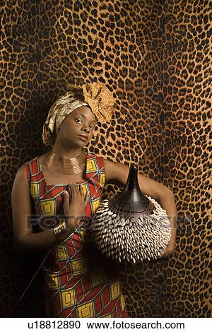 Young Woman in Traditional African Dress View Large Photo Image Stock Image - Young Woman in Traditional African Dress. Fotosearch