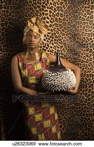 Young Woman in Traditional African Dress View Large Photo Image Stock Photo - Young Woman in Traditional African Dress. Fotosearch