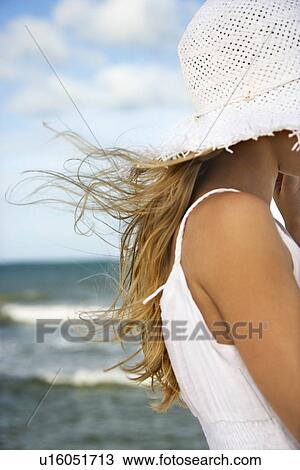Young woman on the Beach View Large Photo Image Stock Image - Young woman on the Beach. Fotosearch