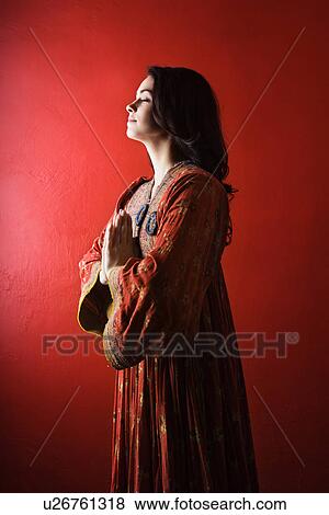 Young Woman Praying, Isolated View Large Photo Image Stock Photo - Young Woman Praying, Isolated. Fotosearch
