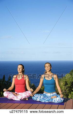 Young Women Doing Yoga View Large Photo Image Stock Photography - Young Women Doing Yoga. Fotosearch