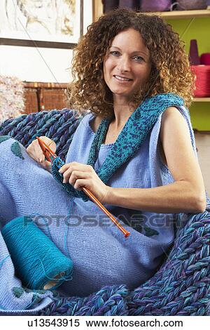 Close Up Of Woman Sitting In Chair Knitting View Large Photo Image Stock Photography - Close Up Of Woman Sitting In Chair Knitting. Fotosearch