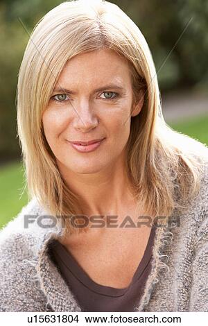 Picture - Close Up Portrait Of Blonde Woman Outdoors. Fotosearch