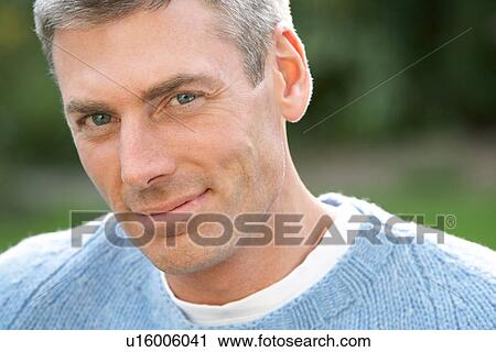 Close Up Portrait Of Man Standing Outside In Autumn Landscape View Large Photo Image Stock Image - Close Up Portrait Of Man Standing Outside In Autumn Landscape. Fotosearch