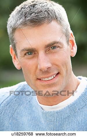 Close Up Portrait Of Man Standing Outside In Autumn Landscape View Large Photo Image Stock Photo - Close Up Portrait Of Man Standing Outside In Autumn Landscape. Fotosearch