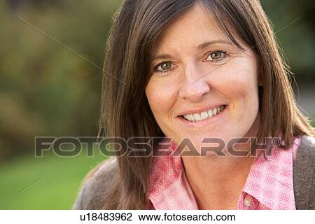 Close Up Portrait Of Smiling Brunette Woman Outdoors View Large Photo Image Stock Image - Close Up Portrait Of Smiling Brunette Woman Outdoors. Fotosearch