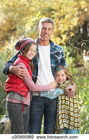 Father And Children Standing Outdoors On Wooden Walkway In Autumn Landscape View Large Photo Image Stock Photo - Father And Children Standing Outdoors On Wooden Walkway In Autumn Landscape. Fotosearch