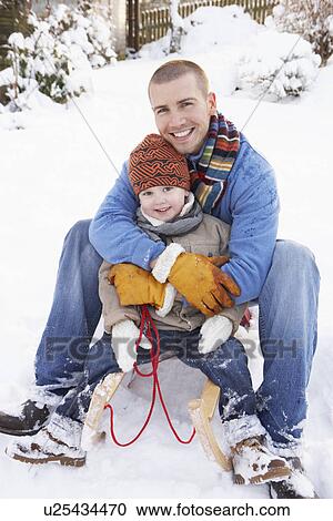Father And Son Sitting On Sledge View Large Photo Image Stock Image - Father And Son Sitting On Sledge. Fotosearch