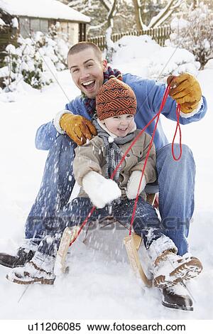 Father And Son Sitting On Sledge View Large Photo Image Stock Photography - Father And Son Sitting On Sledge. Fotosearch
