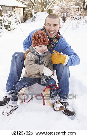 Father And Son Sitting On Sledge View Large Photo Image Stock Photography - Father And Son Sitting On Sledge. Fotosearch
