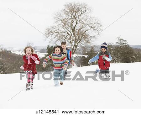 Group Of Children Having Fun In Snowy Countryside View Large Photo Image Stock Image - Group Of Children Having Fun In Snowy Countryside. Fotosearch