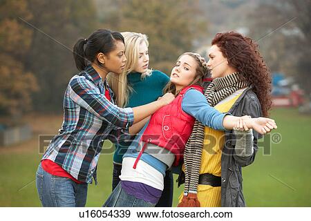 Group Of Female Teenagers Bullying Girl View Large Photo Image Stock Photo - Group Of Female Teenagers Bullying Girl. Fotosearch