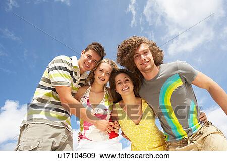 Group Of Friends Having Fun On Summer Beach View Large Photo Image Stock Photo - Group Of Friends Having Fun On Summer Beach. Fotosearch