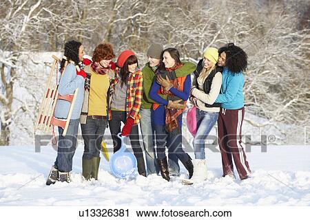 Group Of Teenage Friends Having Fun In Snowy Landscape View Large Photo Image Stock Image - Group Of Teenage Friends Having Fun In Snowy Landscape. Fotosearch