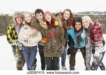 Group Of Teenage Friends Having Fun In Snowy Landscape View Large Photo Image Stock Photography - Group Of Teenage Friends Having Fun In Snowy Landscape. Fotosearch