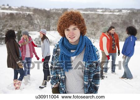 Group Of Young Friends Having Fun In Snowy Landscape View Large Photo Image Picture - Group Of Young Friends Having Fun In Snowy Landscape. Fotosearch