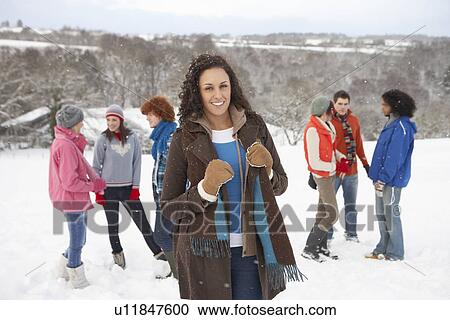 Group Of Young Friends Having Fun In Snowy Landscape View Large Photo Image Stock Image - Group Of Young Friends Having Fun In Snowy Landscape. Fotosearch