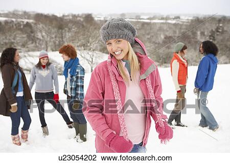 Group Of Young Friends Having Fun In Snowy Landscape View Large Photo Image Stock Image - Group Of Young Friends Having Fun In Snowy Landscape. Fotosearch