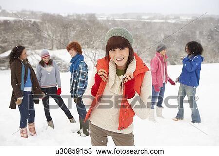 Group Of Young Friends Having Fun In Snowy Landscape View Large Photo Image Stock Image - Group Of Young Friends Having Fun In Snowy Landscape. Fotosearch