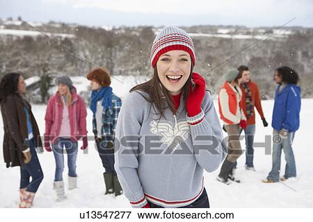 Group Of Young Friends Having Fun In Snowy Landscape View Large Photo Image Stock Photo - Group Of Young Friends Having Fun In Snowy Landscape. Fotosearch
