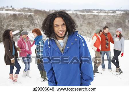 Group Of Young Friends Having Fun In Snowy Landscape View Large Photo Image Stock Photo - Group Of Young Friends Having Fun In Snowy Landscape. Fotosearch