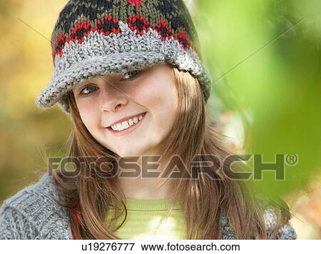 Head And Shoulders Of Young Girl In Autumn Woodland View Large Photo Image Stock Photo - Head And Shoulders Of Young Girl In Autumn Woodland. Fotosearch