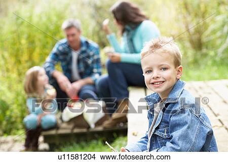 Parents And Children Having Picnic In Countryside View Large Photo Image Picture - Parents And Children Having Picnic In Countryside. Fotosearch