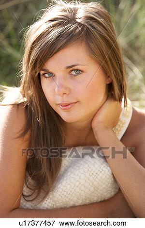 Portrait Of Beautiful Young Woman Relaxing On Beach View Large Photo Image Stock Photo - Portrait Of Beautiful Young Woman Relaxing On Beach. Fotosearch