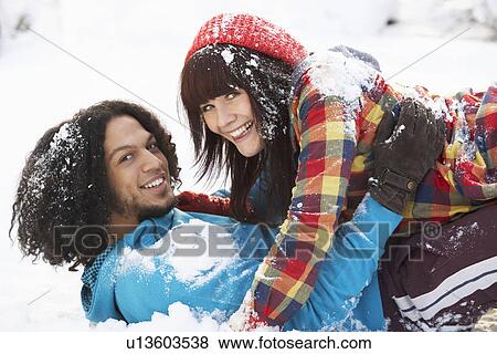 Romantic Teenage Couple Having Fun In Snow View Large Photo Image Stock Photo - Romantic Teenage Couple Having Fun In Snow. Fotosearch