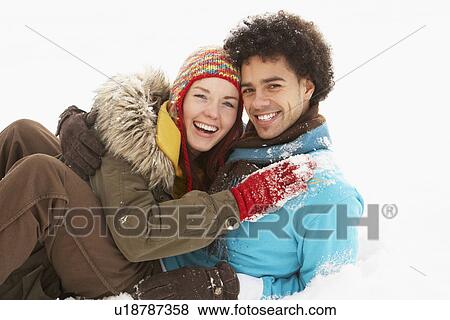 Romantic Teenage Couple Having Fun In Snow View Large Photo Image Stock Photo - Romantic Teenage Couple Having Fun In Snow. Fotosearch
