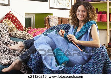 Woman Sitting In Chair Knitting View Large Photo Image Stock Photograph - Woman Sitting In Chair Knitting. Fotosearch