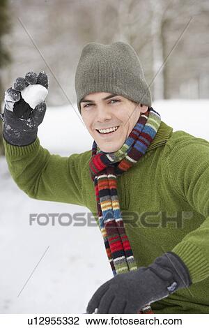 Young Man About To Throw Snowball View Large Photo Image Stock Image - Young Man About To Throw Snowball. Fotosearch