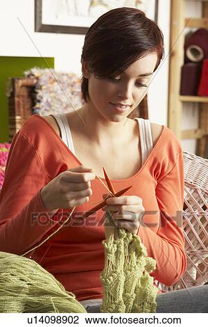 Young Woman Sitting In Chair Knitting View Large Photo Image Stock Image - Young Woman Sitting In Chair Knitting. Fotosearch