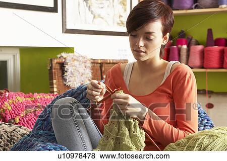 Young Woman Sitting In Chair Knitting View Large Photo Image Stock Photo - Young Woman Sitting In Chair Knitting. Fotosearch