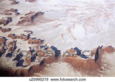 Stock Photo - Aerial view of snow covered desert. Fotosearch