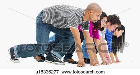 Stock Photo - Athletes ready to race. Fotosearch