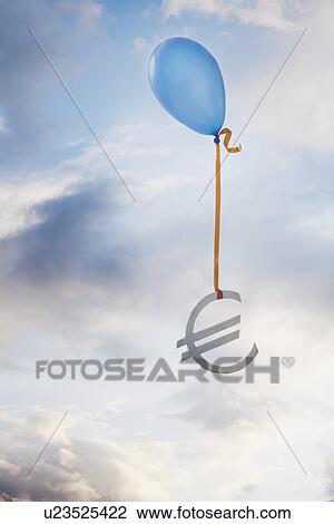 Stock Image - Balloon tied to a euro symbol. Fotosearch