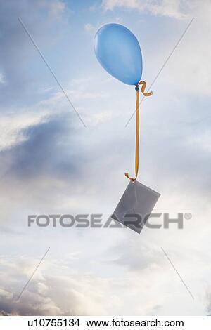 Balloon tied to an envelope View Large Photo Image Picture - Balloon tied to an envelope. Fotosearch