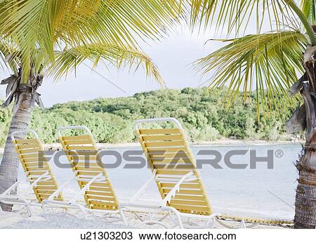 Stock Image - Beach chairs. Fotosearch