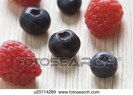 Stock Photo - Blueberries and raspberries. Fotosearch
