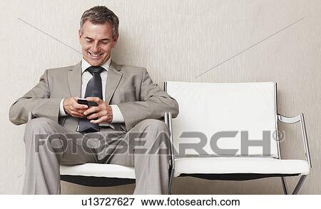 Businessman waiting View Large Photo Image Stock Photo - Businessman waiting. Fotosearch